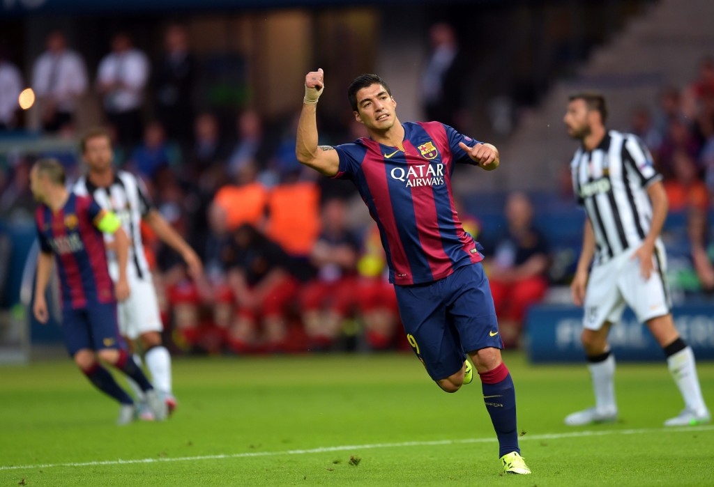epa04786835 Barcelona's Luis Suarez (2-R) reacts during the UEFA Champions League final between Juventus FC and FC Barcelona at the Olympic stadium in Berlin, Germany, 06 June 2015.  EPA/FEDERICO GAMBARINI